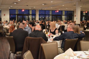 A Banquet Hall Full Of People Attending A Hope Foundation Fundraiser